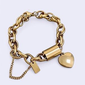 Gold Oval Link Bracelet with Heart Charm and Safety Chain